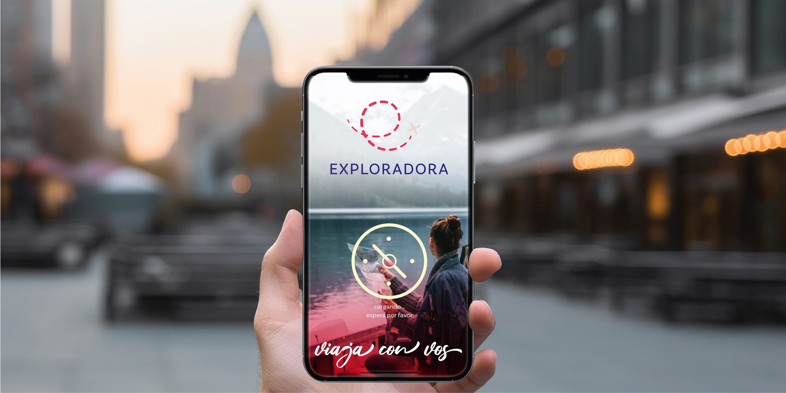 Exploradora E-Commerce on a phone screen, on the street